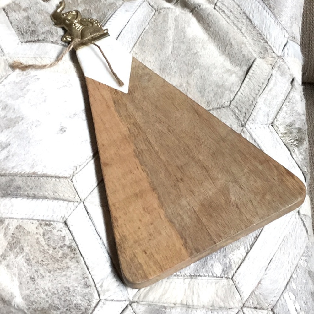 Cheese cutting serving charcuterie board elephant Easter brunch chic Bali party